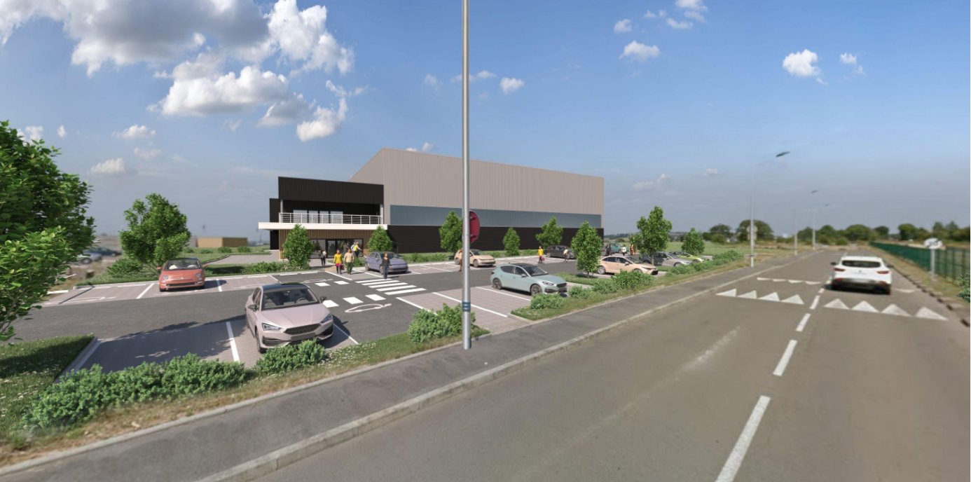 Vue aérienne du complexe LE SPOT et son parking gratuit à Vire Normandie